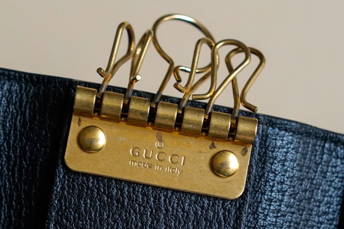Gucci Black Leather Key Case with Star and Bee Motifs
