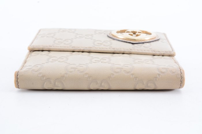 Gucci Guccissima Leather Wallet in Beige