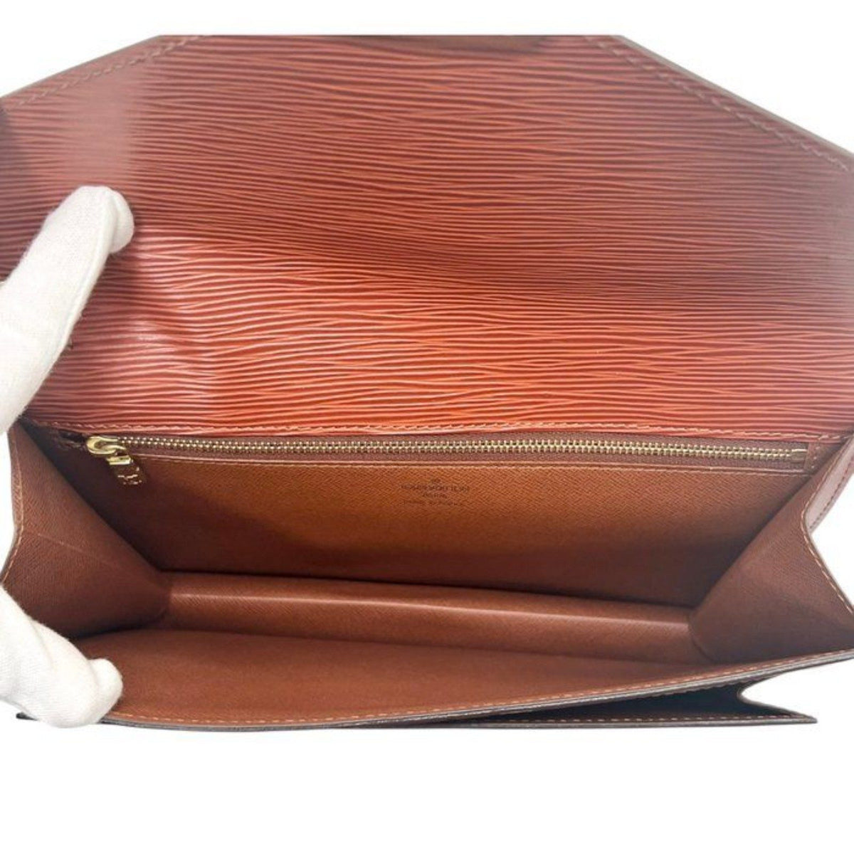 Louis Vuitton brown Epi leather pochette bag with gold hardware and textured finish.