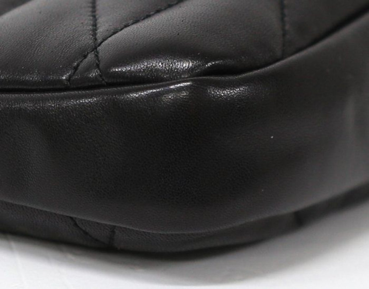 Saint Laurent black hobo bag diamond quilted lambskin with gold Cassandre logo.