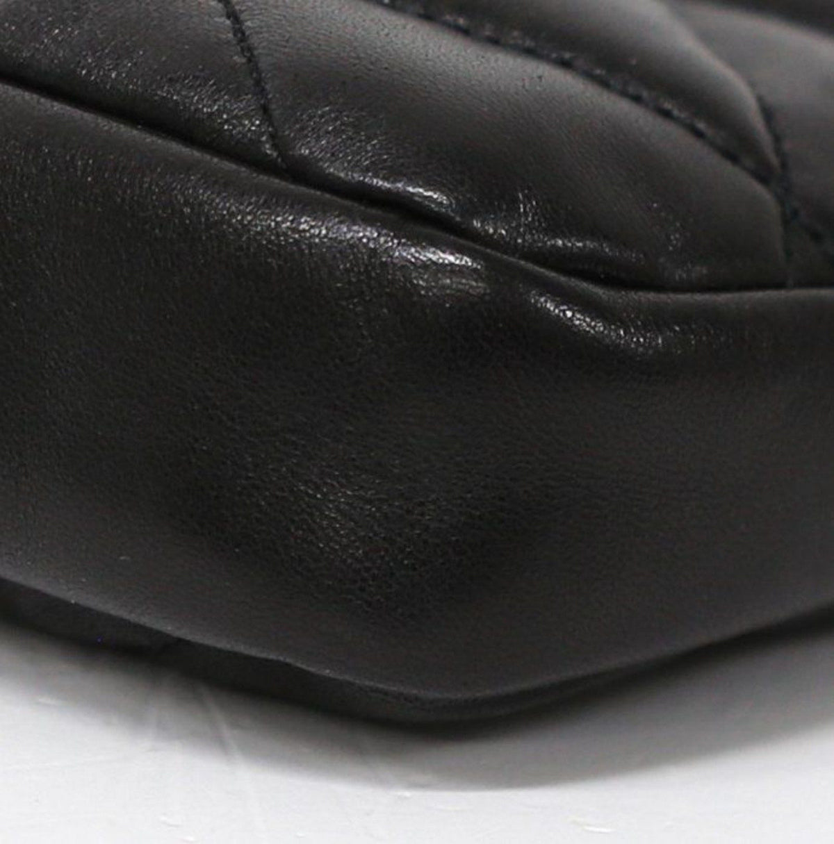 Saint Laurent black hobo bag diamond quilted lambskin with gold Cassandre logo.