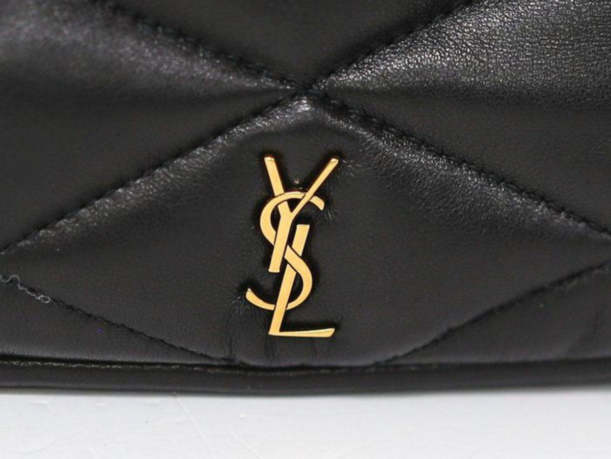 Saint Laurent black hobo bag diamond quilted lambskin with gold Cassandre logo.