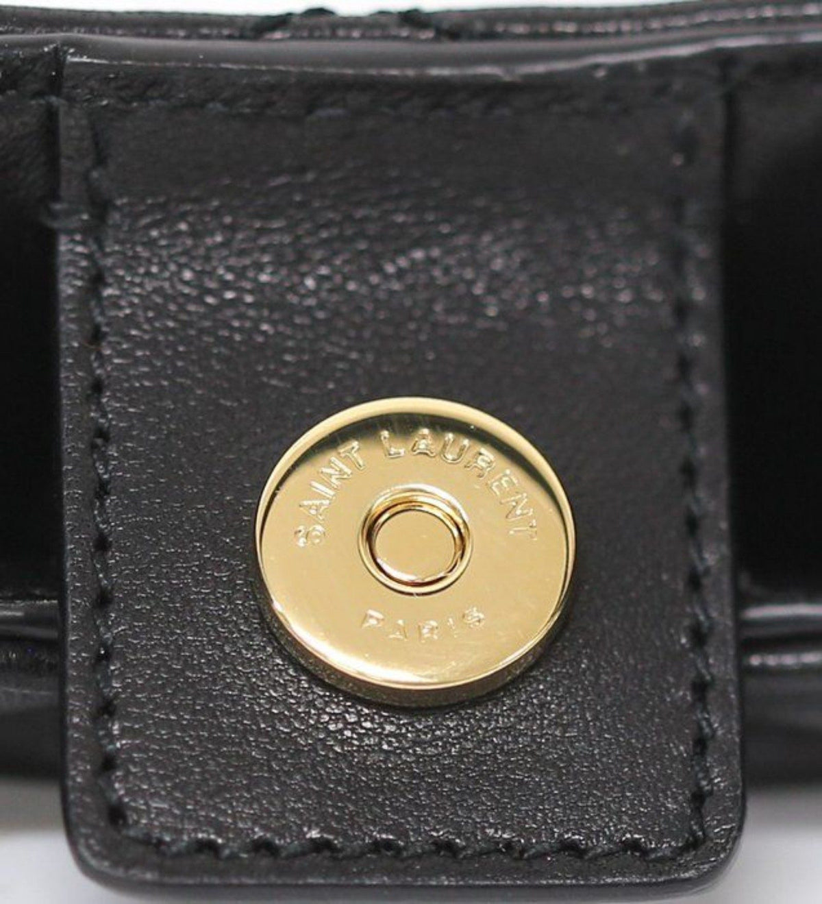 Saint Laurent black hobo bag diamond quilted lambskin with gold Cassandre logo.