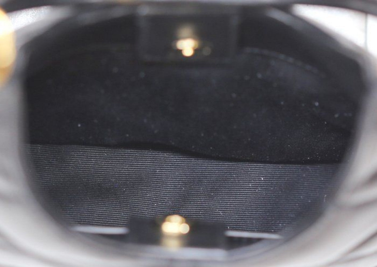 Saint Laurent black hobo bag diamond quilted lambskin with gold Cassandre logo.
