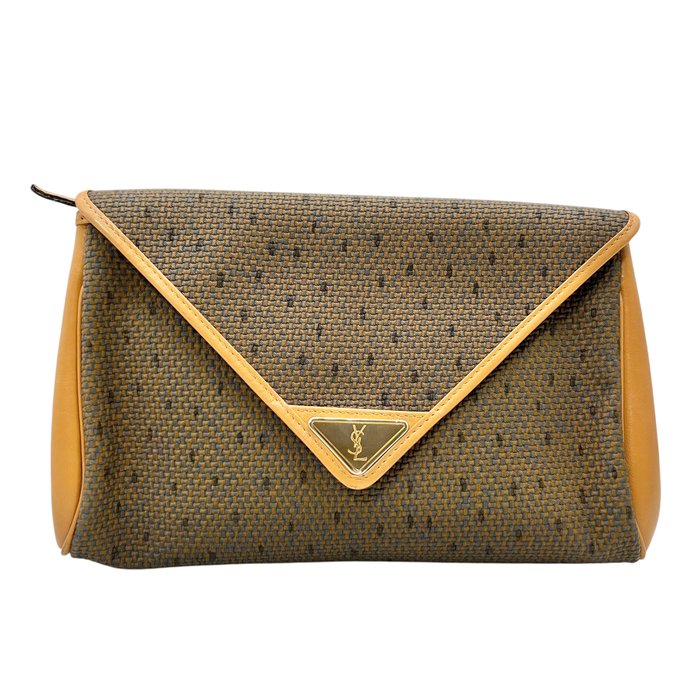 A Saint Laurent envelope clutch bag in their signature monogram coated canvas with tan leather trim and a gold-tone YSL logo plaque on the front flap.